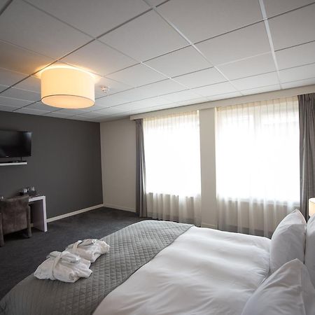 Hotel Het Raedthuys Sint-Maartensdijk Bagian luar foto