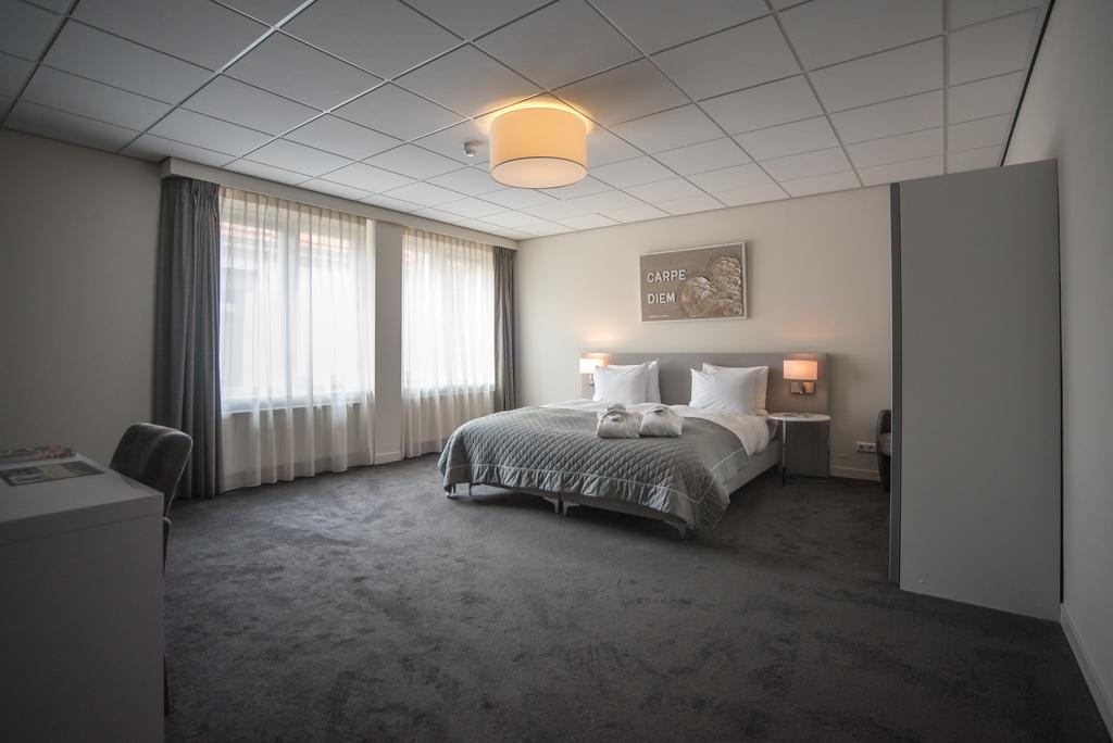 Hotel Het Raedthuys Sint-Maartensdijk Bagian luar foto